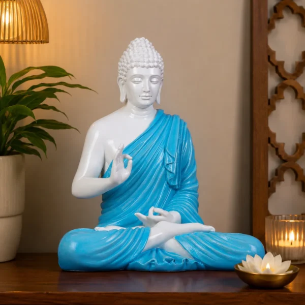 Elegant white and blue Buddha statue placed in a modern home décor setting for spiritual ambiance.