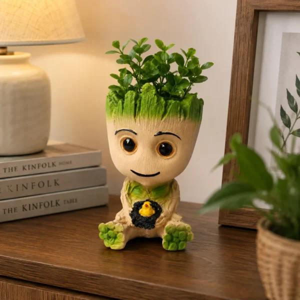 Baby Groot planter made of polyresin placed on wooden table for home decor