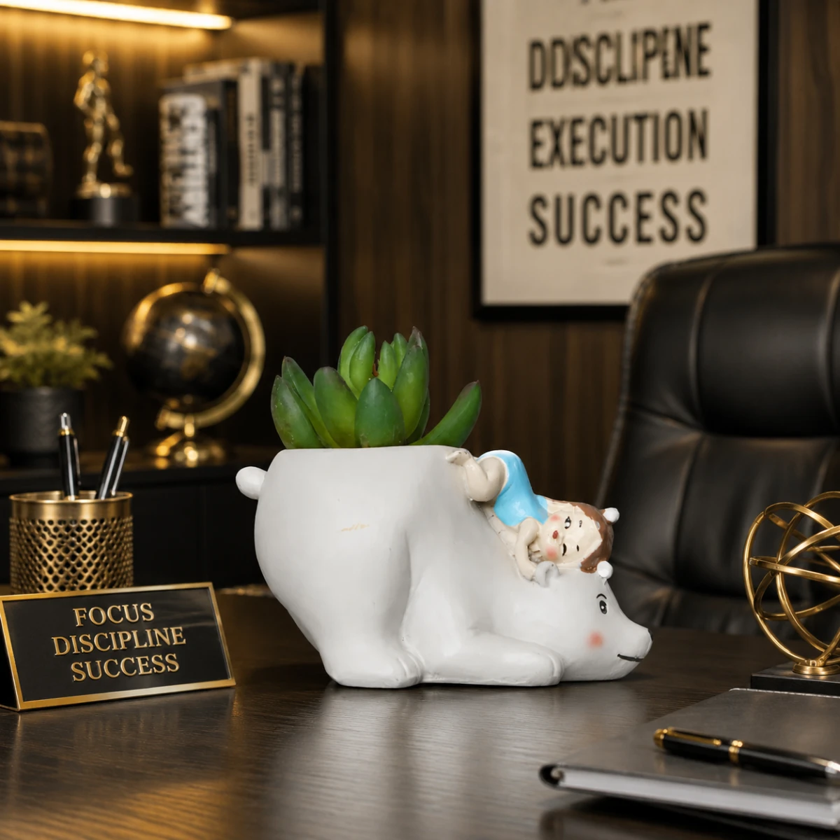 Decorative resin blue bear planter placed on stylish office desk with succulent plant