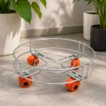 Reliable cylinder trolley with orange wheels placed on modern home flooring.