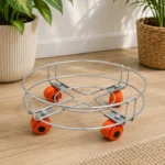 Heavy-duty gas cylinder trolley with smooth wheels on wooden floor surface.