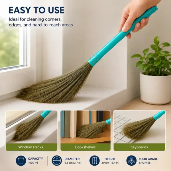 Hand using broom for detailed dust cleaning