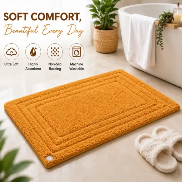 Luxury mustard yellow bath mat with ultra-soft texture and absorbent surface.