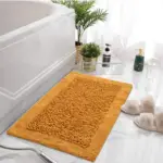 Green Tales mustard bath mat for absorbing excess water and keeping bathroom floors dry