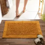 Green Tales Twist bathmat in mustard for comfortable bathroom use