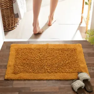 Green Tales Twist bathmat in mustard for comfortable bathroom use