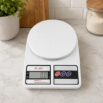 Reliable SF-400 digital kitchen scale displayed on modern kitchen countertop.