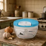 Reliable vegetable chopper with transparent container and sturdy hand-pull chopping system.