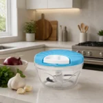 Premium manual food chopper with transparent bowl and sharp blades for quick kitchen prep.