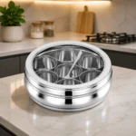 Premium stainless steel spice box placed on a modern kitchen countertop.