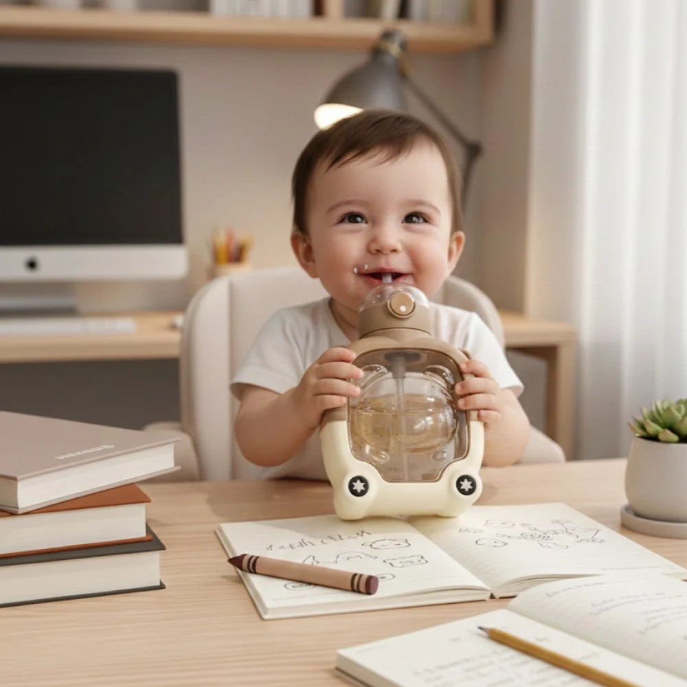Best teddy bear water bottle used by happy child at study table.