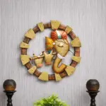TINUMS golden Ganesha wall decoration with unique flute-playing design for home decor