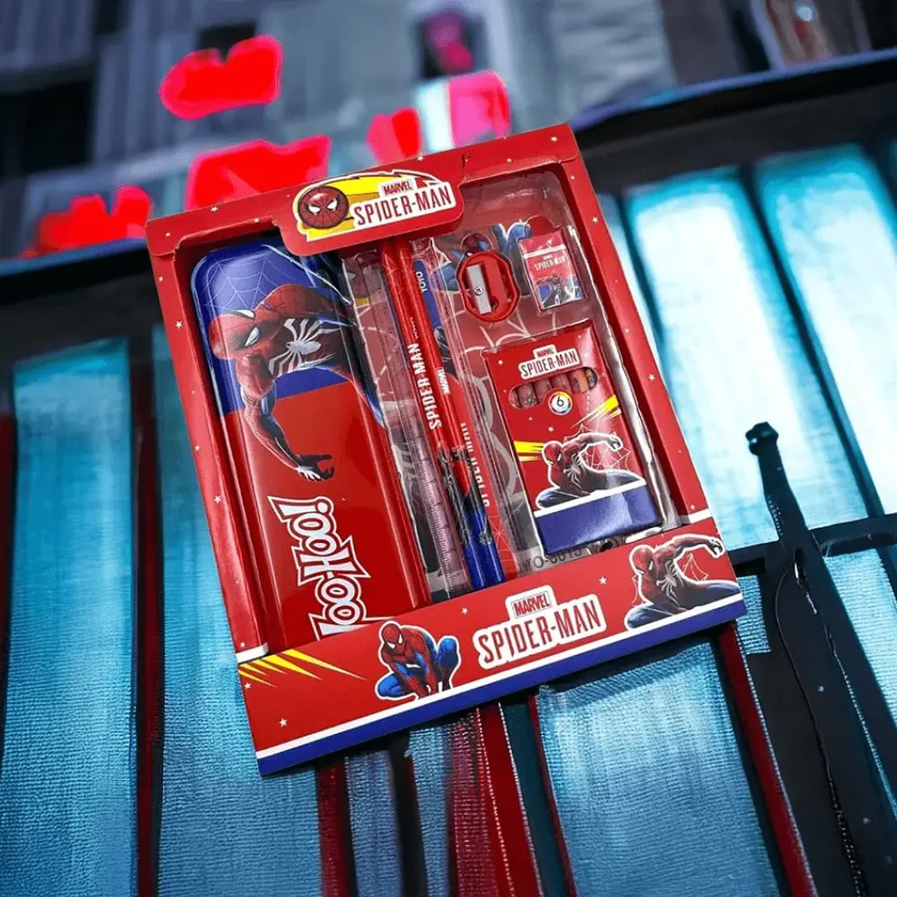 TINUMS Spiderman themed stationery kit placed in modern kids study setup with colorful lighting