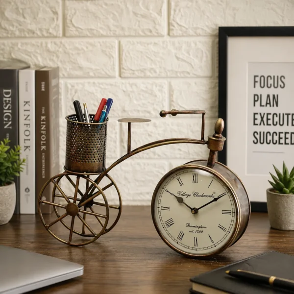 Vintage bicycle metal table clock with pen stand placed on office desk décor setup