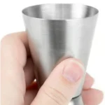 Durable stainless steel peg measurer with ergonomic grip and smooth brushed metal finish.