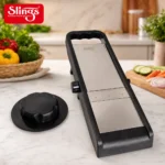 High-quality stainless steel vegetable slicer with safety holder and ergonomic handle.