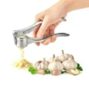 Heavy-duty garlic crusher delivering smooth and efficient garlic mincing for cooking.