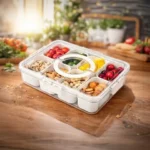Elegant multi-section snack organizer box with clear lid for fresh food storage.