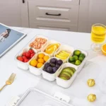 Premium multi-compartment food storage tray with fruits and snacks for organized freshness.