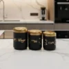 Luxury tea coffee sugar storage jars with gold lids for modern kitchen organization.