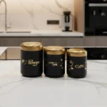 Luxury tea coffee sugar storage jars with gold lids for modern kitchen organization.