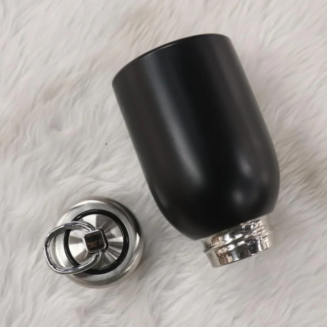 Durable thermal flask bottle with removable steel lid and wide mouth opening.