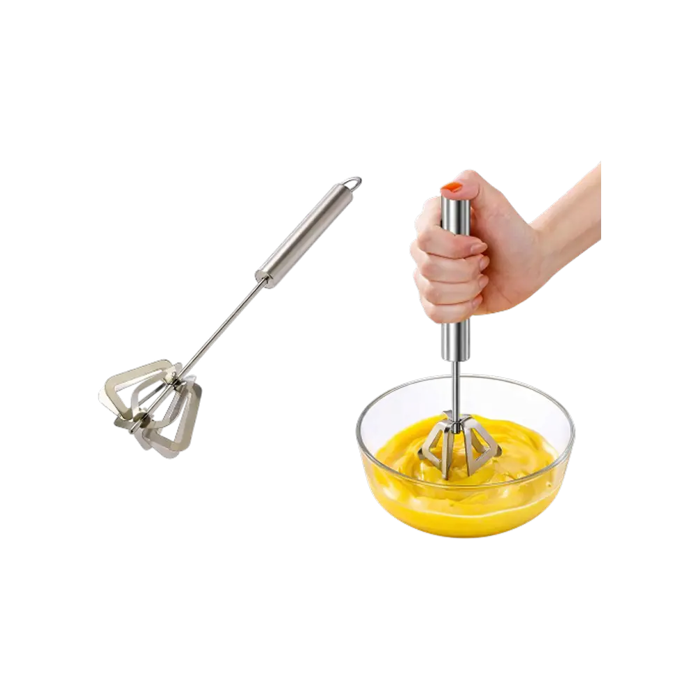 Durable stainless steel semi-automatic egg whisk mixing eggs with push-action handle.