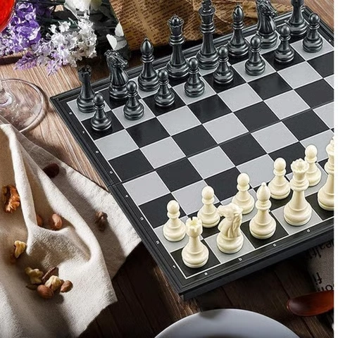 Elegant magnetic chess board with detailed pieces for enjoyable indoor gaming sessions.