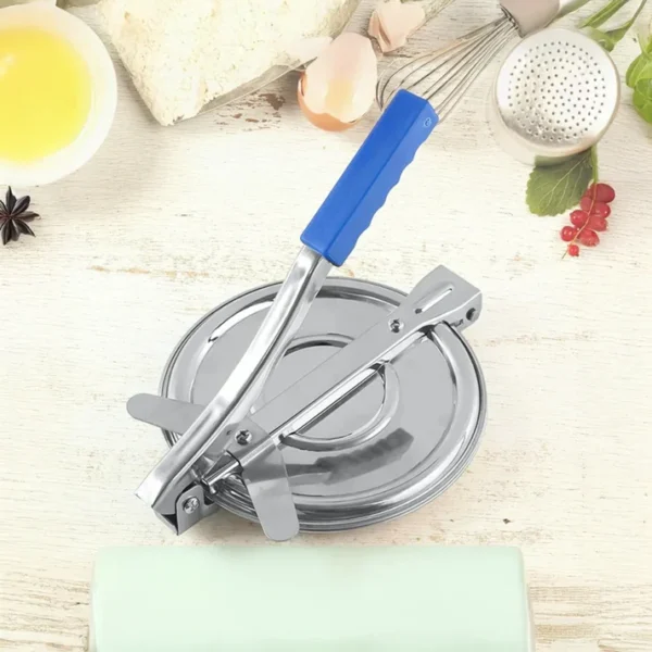 Heavy-duty stainless steel roti press with ergonomic handle for efficient kitchen preparation.