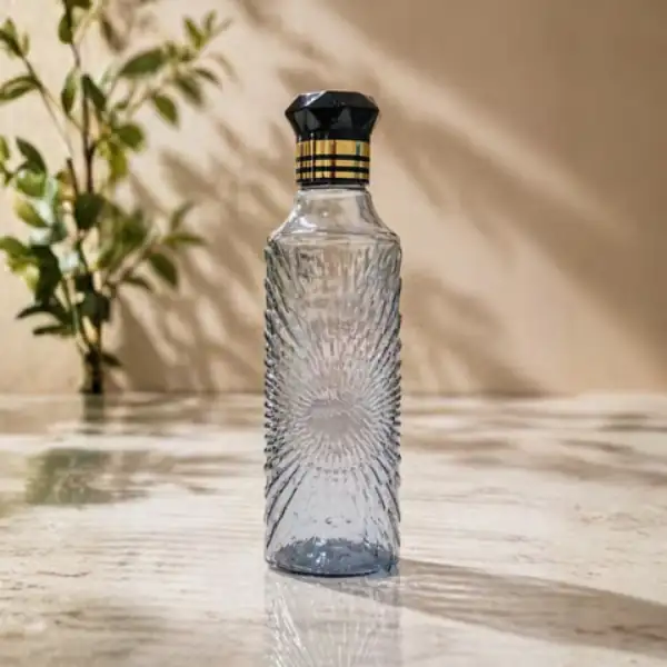 Premium clear textured glass bottle with luxury crystal cap