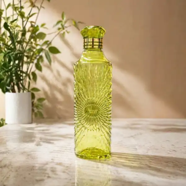 Elegant green textured glass bottle for everyday hydration