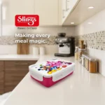 Pink Disney lunch box displayed on modern kitchen countertop