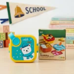 Adorable school lunch box with white bear artwork and portable design