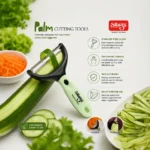 Professional vegetable peeler slicing cucumber with premium stainless steel blade.