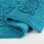 Cotton tufted twist bathmat in turquoise