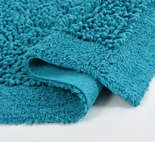 Cotton tufted twist bathmat in turquoise