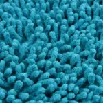 Cotton tufted twist bathmat in turquoise