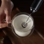 Handheld milk frother with stainless steel whisk