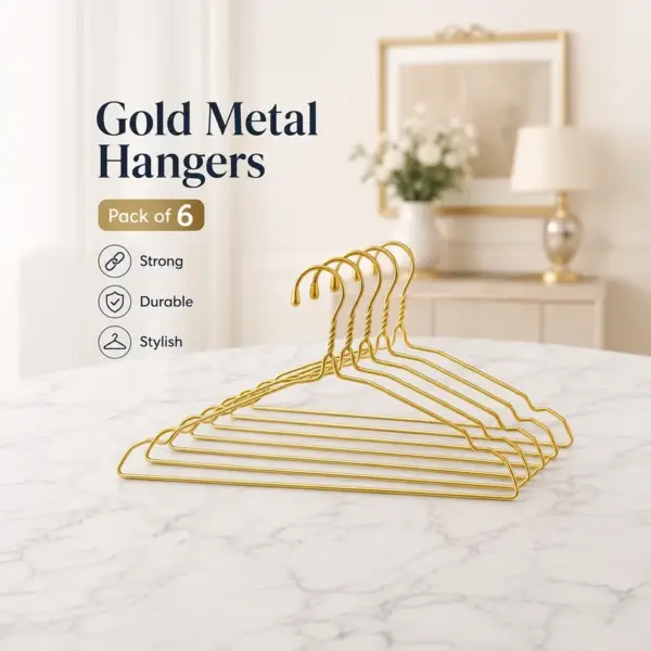 TINUMS slim golden metal hangers for efficient wardrobe organization