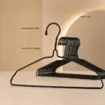 Tinums slim metal clothes hangers designed to save wardrobe space